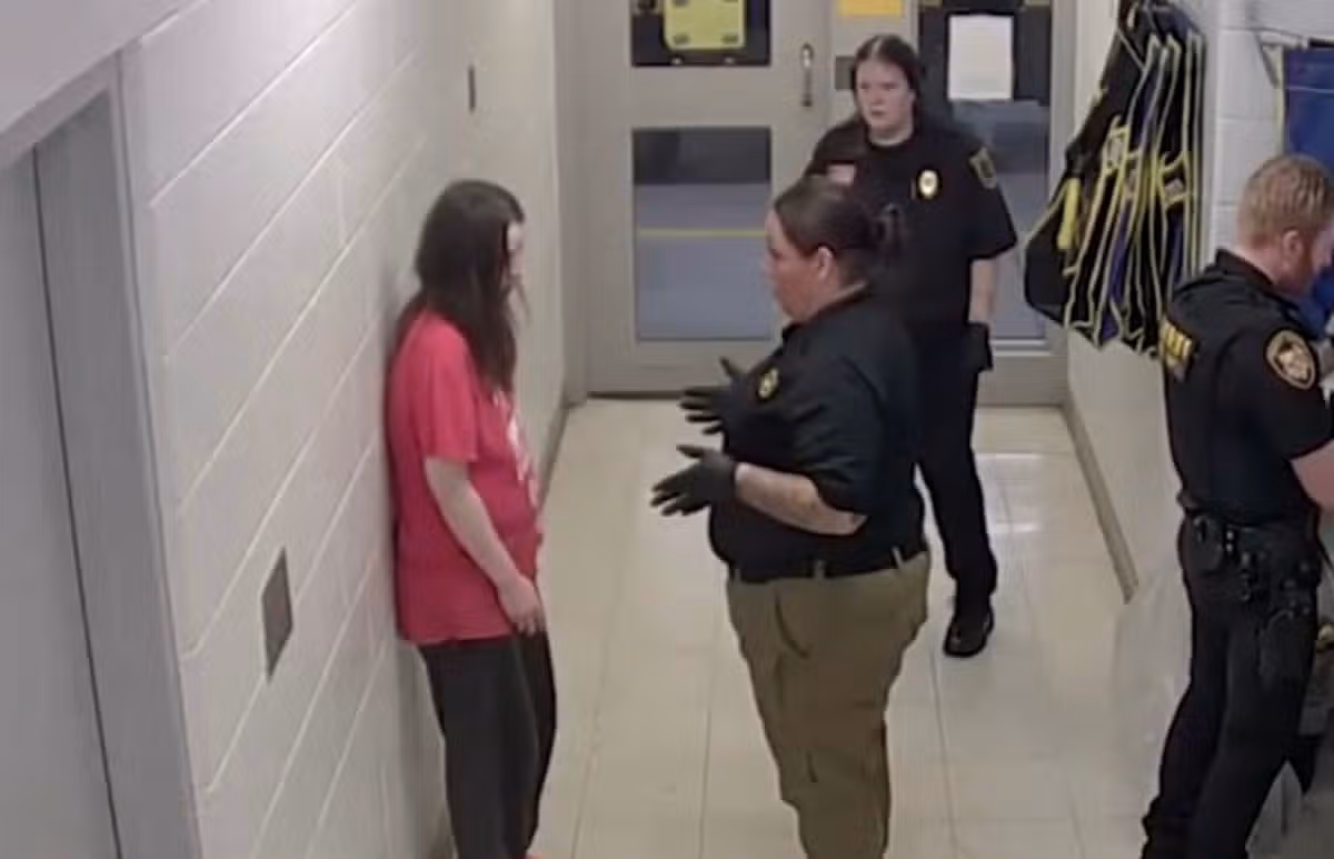 Christina's daughter-in-law, Elizabeth Siders, was seen wearing a pink t-shirt in the same footage