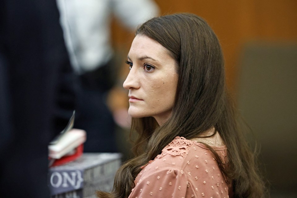 Lindsay Clancy watches the jury enter the courtroom during her murder trial.