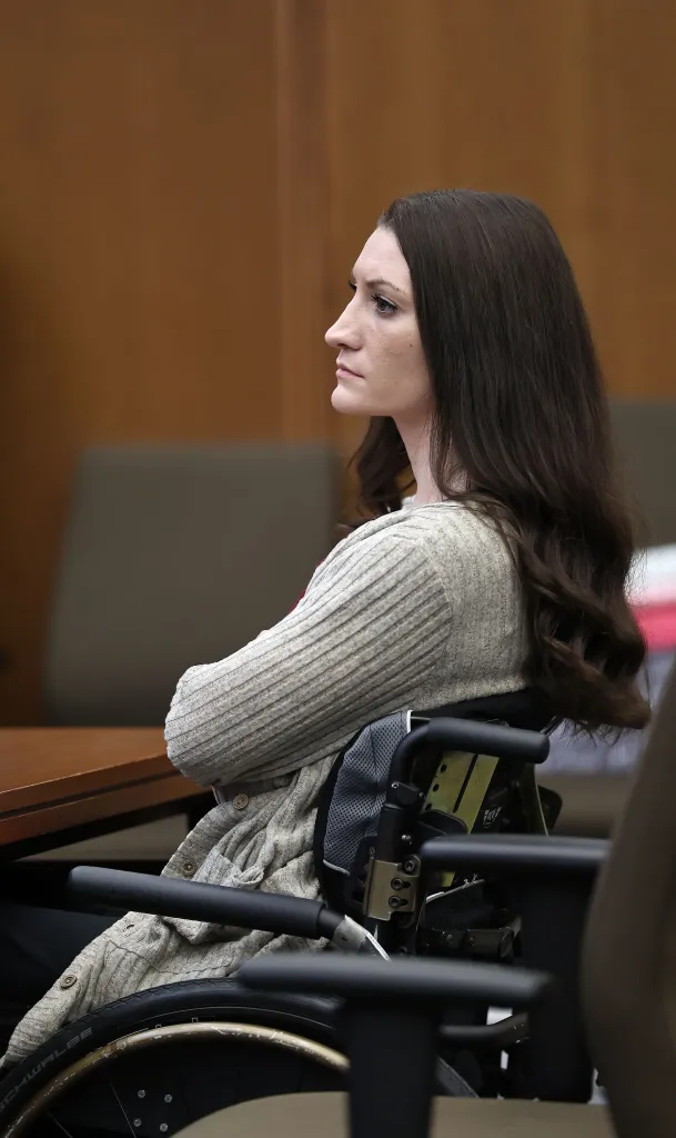 Lindsay Clancy listens to testimony at her murder trial.