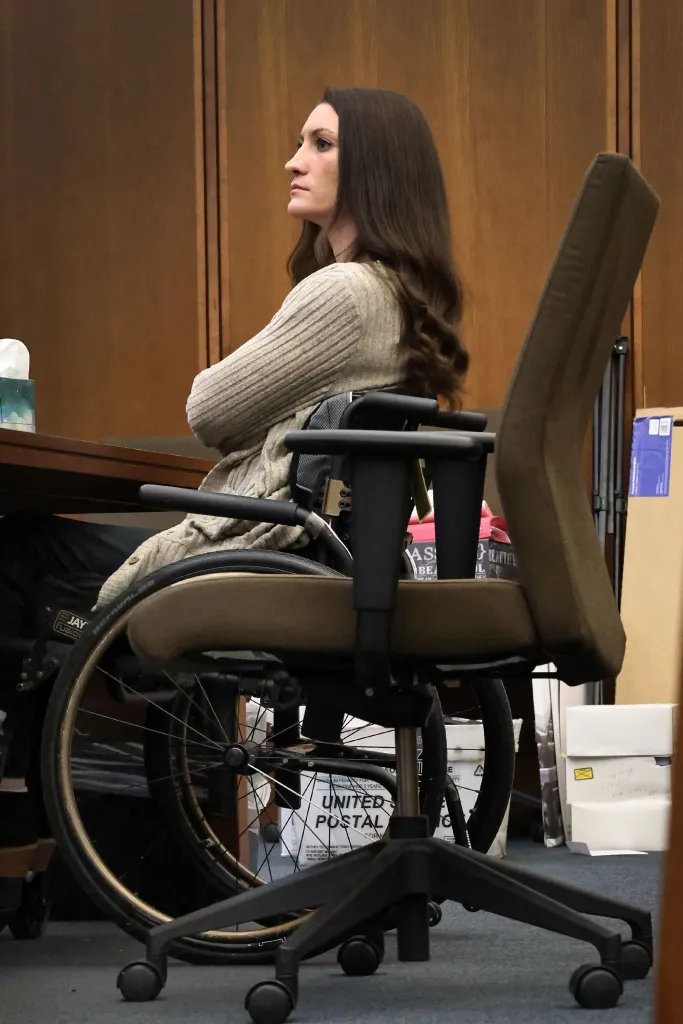 Lindsay Clancy in a wheelchair in court during her murder trial.