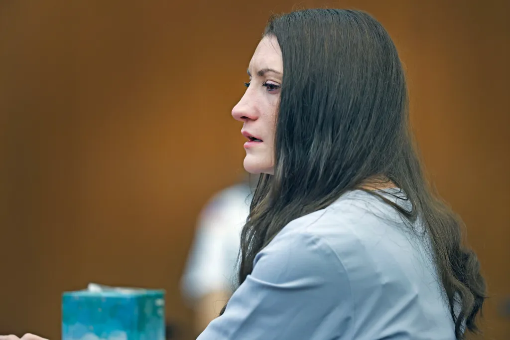 Lindsay Clancy trying to hold back tears during her murder trial.