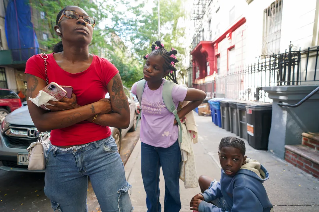 Asia Walker, 33, returned with her five children to the Washington Heights building where her sister, Lovay Williams, was killed.